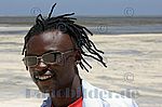 Portrait,Schwarzer,Mann,Sonnenbrille,Strand,lächeln,Kenia